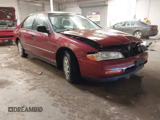 1994 Honda Accord DX with VIN 1HGCD562XRA176098, listed as a IAAI auction lot 41228156 with 113,553 mi miles. Bid and sale history available at carsss.com. Image 1.