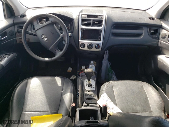 2009 Kia Sportage LX with VIN KNDJF723X97602184, listed as a Copart auction lot 74571614 with 44,247 mi miles and Salvage Title. Bid and sale history available at carsss.com. Image 8.