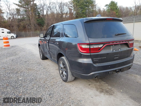 2015 Dodge Durango SXT with VIN 1C4RDJAG4FC784865, listed as a IAAI auction lot 40872452 with 145,877 mi miles and . Bid and sale history available at carsss.com. Image 3.
