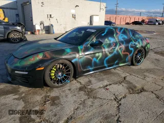 2015 Porsche Panamera S E-Hybrid z VIN WP0AD2A72FL040376, wystawiony jako Copart lot #45659795 z przebiegiem 85 433 mil mil oraz Szkody całkowita. Historia ofert i sprzedaży dostępna na DreamBid. Obrazek 1.
