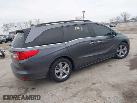 2018 Honda Odyssey EX-L with VIN 5FNRL6H72JB076597, listed as a IAAI auction lot 41838664 with 154,647 mi miles and . Bid and sale history available at DreamBid. Image 4.