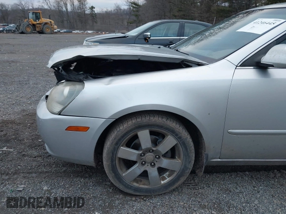 2007 Kia Optima EX with VIN KNAGE124375162317, listed as a IAAI auction lot 41246445 with 174,128 mi miles. Bid and sale history available at carsss.com. Image 12.