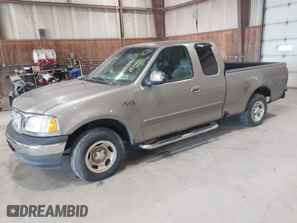 2001 Ford F-150 XL z VIN 1FTZX17241NB44865, wystawiony jako IAAI lot #42033863 z przebiegiem 145 072 mil mil oraz . Historia ofert i sprzedaży dostępna na DreamBid. Obrazek 2.