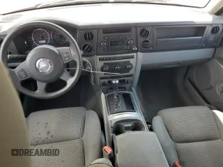 2007 Jeep Commander Sport z VIN 1J8HG48K27C527423, wystawiony jako Copart lot #63448765 z przebiegiem 212 856 mil mil oraz Szkoda całkowita • Salvage title. Historia ofert i sprzedaży dostępna na DreamBid. Obrazek 8.