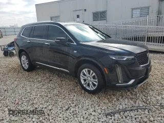 2021 Cadillac XT6 Luxury with VIN 1GYKPAR46MZ124270, listed as a Copart auction lot 44359615 with 149,820 mi miles and Clean title. Bid and sale history available at DreamBid. Image 4.
