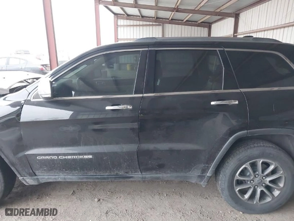 2014 Jeep Grand Cherokee Limited with VIN 1C4RJFBG3EC403882, listed as a IAAI auction lot 41394712 with 168,892 mi miles. Bid and sale history available at carsss.com. Image 14.
