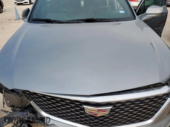 2024 Cadillac XT6 FWD Luxury with VIN 1GYKPAR41RZ700452, listed as a Copart auction lot 57675945 with 27,449 mi miles and Salvage title. Bid and sale history available at DreamBid. Image 12.