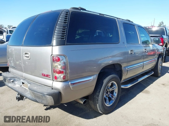 2000 GMC Yukon XL SLT with VIN 3GKFK16T8YG205654, listed as a IAAI auction lot 41403249 with 129,815 mi miles. Bid and sale history available at carsss.com. Image 4.