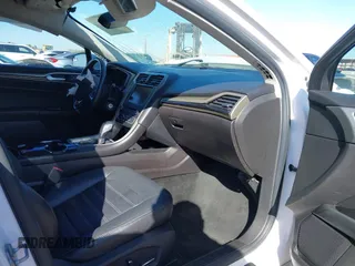 2016 Ford Fusion SE with VIN 3FA6P0HD4GR384880, listed as a IAAI auction lot 41663361 with 125,352 mi miles. Bid and sale history available at carsss.com. Image 5.