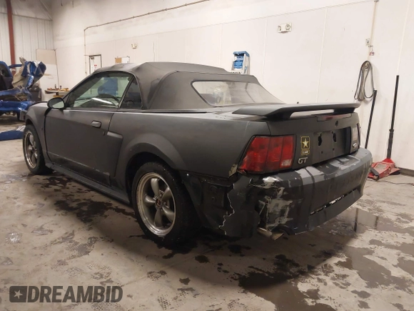2002 Ford Mustang GT Deluxe z VIN 1FAFP45X92F176117, wystawiony jako IAAI lot #41619448 z przebiegiem 178 787 mil mil oraz . Historia ofert i sprzedaży dostępna na DreamBid. Obrazek 3.