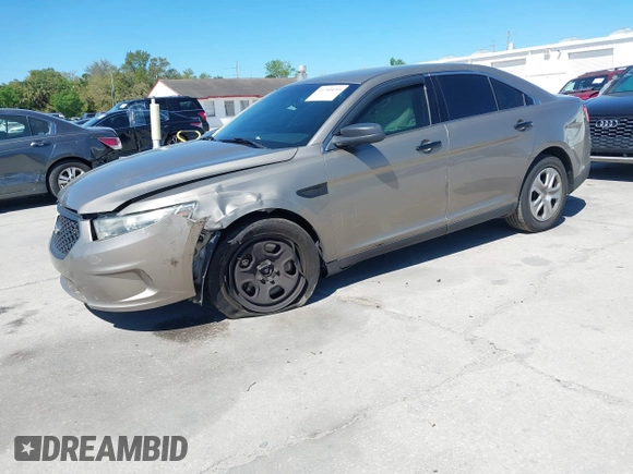 2015 Ford Police Interceptor with VIN 1FAHP2L89FG162131, listed as a IAAI auction lot 41740659 with 124,537 mi miles and . Bid and sale history available at DreamBid. Image 2.