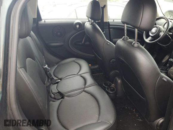 2014 MINI Countryman S with VIN WMWZC5C58EWP39797, listed as a Copart auction lot 62193515 with 84,989 mi miles and Salvage title. Bid and sale history available at DreamBid. Image 10.