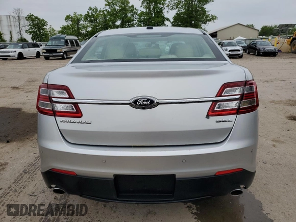 2017 Ford Taurus SEL z VIN 1FAHP2E87HG119780, wystawiony jako Copart lot #59135705 z przebiegiem 122 731 mil mil oraz Szkoda całkowita • Salvage title. Historia ofert i sprzedaży dostępna na DreamBid. Obrazek 6.