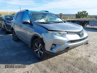 2018 Toyota RAV4 XLE with VIN JTMWFREV7JD125119, listed as a IAAI auction lot 41841021 with 132,659 mi miles and . Bid and sale history available at DreamBid. Image 1.