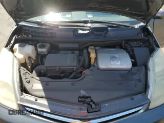 2008 Toyota Prius z VIN JTDKB20U683349935, wystawiony jako Copart lot #52121295 z przebiegiem 181 566 mil mil oraz Szkoda całkowita • Salvage title. Historia ofert i sprzedaży dostępna na DreamBid. Obrazek 11.