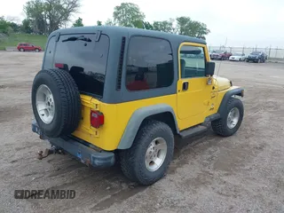 2000 Jeep Wrangler Sport with VIN 1J4FA49S3YP781614, listed as a IAAI auction lot 42292668 with 152,600 mi miles and . Bid and sale history available at DreamBid. Image 4.