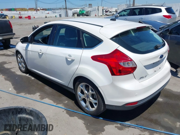 2014 Ford Focus Titanium with VIN 1FADP3N27EL330366, listed as a IAAI auction lot 42719377 with 97,009 mi miles and . Bid and sale history available at DreamBid. Image 3.