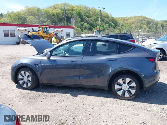 2023 Tesla Model Y Long Range z VIN 7SAYGDEE8PA191415, wystawiony jako IAAI lot #42155577 z przebiegiem 42 149 mil mil oraz . Historia ofert i sprzedaży dostępna na DreamBid. Obrazek 15.