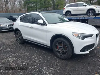 2018 Alfa Romeo Stelvio Sport z VIN ZASFAKPN8J7B82406, wystawiony jako IAAI lot #41822000 z przebiegiem 71 838 mil mil oraz . Historia ofert i sprzedaży dostępna na DreamBid. Obrazek 1.