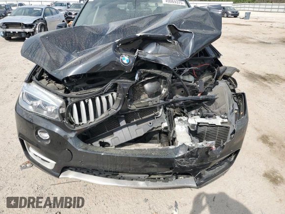 2016 BMW X5 xDrive35i with VIN 5UXKR0C57G0P23150, listed as a Copart auction lot 49069375 with 104,229 mi miles and Salvage Title. Bid and sale history available at carsss.com. Image 14.