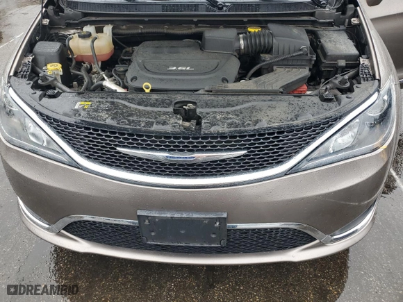2017 Chrysler Pacifica Touring-L Plus with VIN 2C4RC1EG3HR730366, listed as a Copart auction lot 72754524 with 106,499 mi miles and Salvage Title. Bid and sale history available at carsss.com. Image 12.