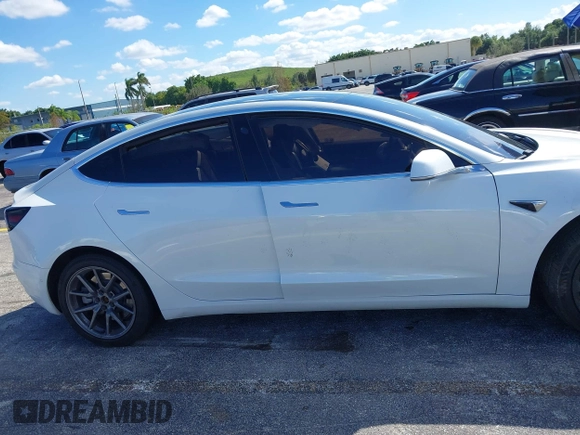 2020 Tesla Model 3 Standard Range Plus with VIN 5YJ3E1EA8LF783631, listed as a IAAI auction lot 40696383 with 78,889 mi miles. Bid and sale history available at carsss.com. Image 12.
