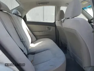 2009 Kia Spectra LX z VIN KNAFE222295640665, wystawiony jako Copart lot #57086945 z przebiegiem 167 640 mil mil oraz Szkoda całkowita • Salvage title. Historia ofert i sprzedaży dostępna na DreamBid. Obrazek 10.