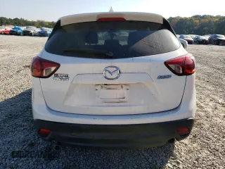 2016 Mazda CX-5 Touring with VIN JM3KE2CY6G0896040, listed as a Copart auction lot 78399684 with 98,639 mi miles and Salvage Title. Bid and sale history available at DreamBid. Image 6.