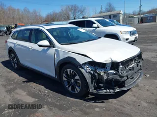 2018 Buick Regal Essence with VIN W04GV8SX4J1153088, listed as a IAAI auction lot 41854415 with 60,714 mi miles and . Bid and sale history available at DreamBid. Image 1.