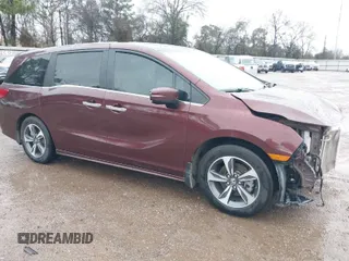 2019 Honda Odyssey Touring with VIN 5FNRL6H82KB060023, listed as a IAAI auction lot 41451199 with 82,994 mi miles. Bid and sale history available at carsss.com. Image 1.