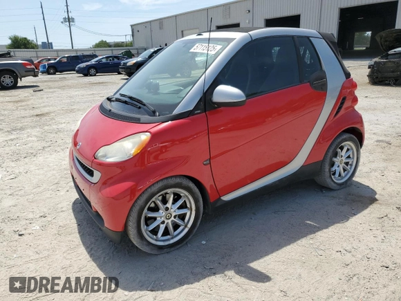 2009 Smart fortwo Passion z VIN WMEEK31XX9K306610, wystawiony jako Copart lot #57115125 z przebiegiem 5478 mil mil oraz Tytuł czysty. Historia ofert i sprzedaży dostępna na DreamBid. Obrazek 1.