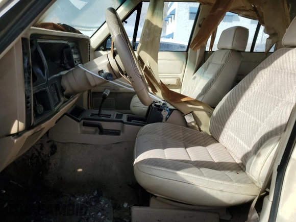 1989 Jeep Cherokee with VIN 1J4FJ38L2KL462983, listed as a Copart auction lot 48012545 with Not provided miles and Salvage title. Bid and sale history available at DreamBid. Image 7.