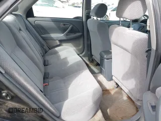 2001 Toyota Camry CE with VIN JT2BG22K910548345, listed as a IAAI auction lot 41723835 with 170,228 mi miles and . Bid and sale history available at DreamBid. Image 8.