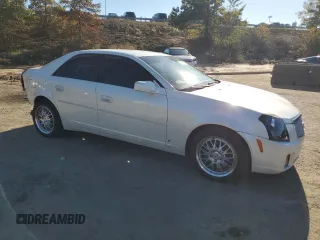 2007 Cadillac CTS with VIN 1G6DP577970122009, listed as a Copart auction lot 79976914 with 124,899 mi miles and Salvage Title. Bid and sale history available at carsss.com. Image 4.