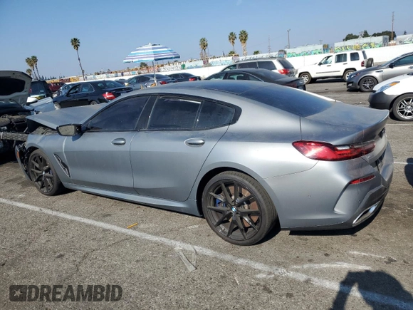 2023 BMW 8 Series M850i z VIN WBAGV8C0XPCK42813, wystawiony jako Copart lot #41823805 z przebiegiem Nie podano mil oraz Szkoda całkowita • Salvage title. Historia ofert i sprzedaży dostępna na DreamBid. Obrazek 2.