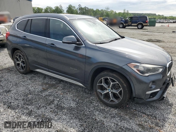 2016 BMW X1 xDrive28i z VIN WBXHT3C37GP888364, wystawiony jako Copart lot #53644975 z przebiegiem 119 725 mil mil oraz Szkoda całkowita • Salvage title. Historia ofert i sprzedaży dostępna na DreamBid. Obrazek 4.