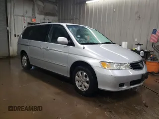 2004 Honda Odyssey EX-L with VIN 5FNRL189X4B098131, listed as a Copart auction lot 47294865 with 196,581 mi miles and Salvage Title. Bid and sale history available at DreamBid. Image 4.