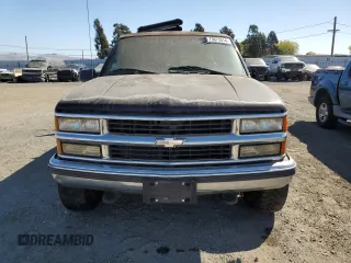 1999 Chevrolet Suburban with VIN 1GNGK26R5XJ513945, listed as a Copart auction lot 73673314 with 198,656 mi miles and Clean Title. Bid and sale history available at carsss.com. Image 5.