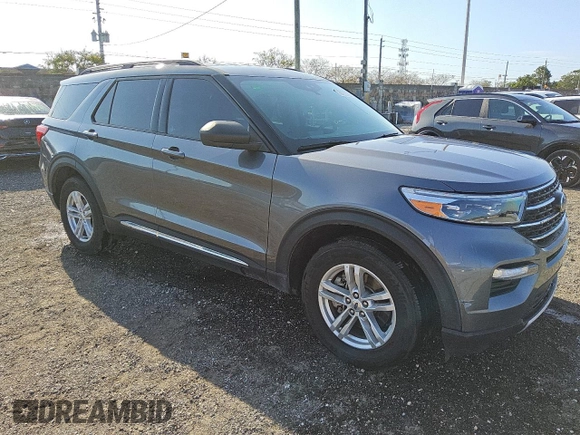 2022 Ford Explorer XLT with VIN 1FMSK8DH7NGA82496, listed as a Copart auction lot 51866865 with 77,014 mi miles and Clean Title. Bid and sale history available at carsss.com. Image 4.