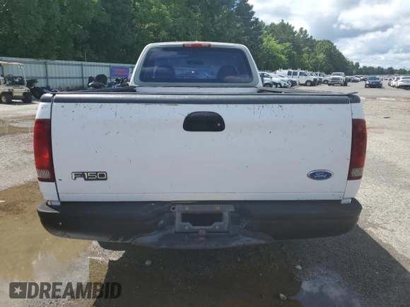 1997 Ford F-150 with VIN 1FTDF1721VND40734, listed as a Copart auction lot 62172315 with 158,102 mi miles and Salvage title. Bid and sale history available at DreamBid. Image 6.