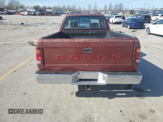1992 Dodge Dakota z VIN 1B7GL23YXNS633409, wystawiony jako Copart lot #51067775 z przebiegiem 153 174 mil mil oraz Szkoda całkowita • Salvage title. Historia ofert i sprzedaży dostępna na DreamBid. Obrazek 6.