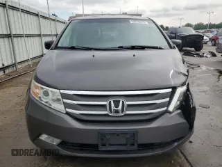 2012 Honda Odyssey Touring with VIN 5FNRL5H94CB109257, listed as a Copart auction lot 59636075 with 107,543 mi miles and Salvage title. Bid and sale history available at DreamBid. Image 5.