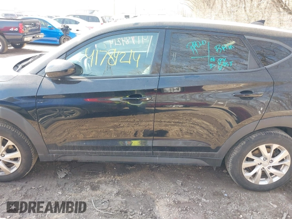 2019 Hyundai Tucson SE with VIN KM8J2CA4XKU852946, listed as a IAAI auction lot 41784214 with 120,857 mi miles. Bid and sale history available at carsss.com. Image 14.