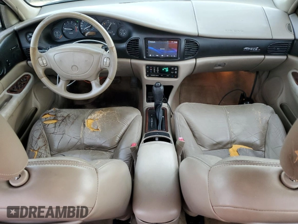 1999 Buick Regal LS with VIN 2G4WB52K4X1601132, listed as a Copart auction lot 73761404 with 92,842 mi miles and Salvage Title. Bid and sale history available at carsss.com. Image 8.