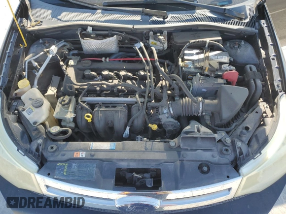 2008 Ford Focus SE z VIN 1FAHP35N08W193642, wystawiony jako Copart lot #53175515 z przebiegiem 199 968 mil mil oraz Szkoda całkowita • Salvage title. Historia ofert i sprzedaży dostępna na DreamBid. Obrazek 11.