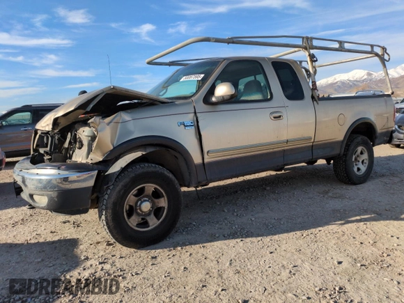 1999 Ford F-150 XL with VIN 1FTRX18L2XKA01348, listed as a Copart auction lot 50087595 with 202,021 mi miles and Salvage Title. Bid and sale history available at carsss.com. Image 1.