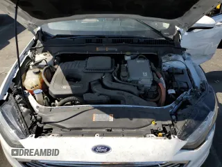 2017 Ford Fusion Hybrid SE z VIN 3FA6P0LU2HR209228, wystawiony jako Copart lot #62518055 z przebiegiem 119 174 mil mil oraz Szkoda całkowita • Salvage title. Historia ofert i sprzedaży dostępna na DreamBid. Obrazek 11.