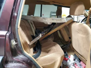 1996 Jeep Grand Cherokee Laredo with VIN 1J4GZ58Y1TC171915, listed as a Copart auction lot 50764034 with 0 mi miles and Salvage Title. Bid and sale history available at carsss.com. Image 11.