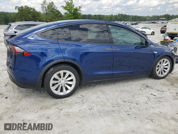2016 Tesla Model X 70D z VIN 5YJXCBE27GF007972, wystawiony jako Copart lot #53945325 z przebiegiem 83 395 mil mil oraz Szkody całkowita. Historia ofert i sprzedaży dostępna na DreamBid. Obrazek 3.