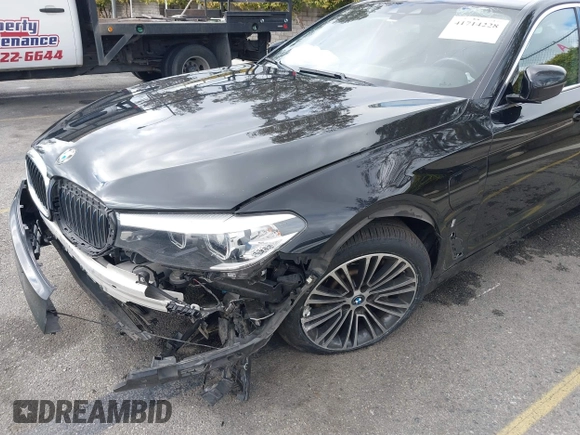 2019 BMW 5 Series 530e with VIN WBAJA9C52KB399480, listed as a IAAI auction lot 41714228 with 90,435 mi miles and . Bid and sale history available at DreamBid. Image 6.